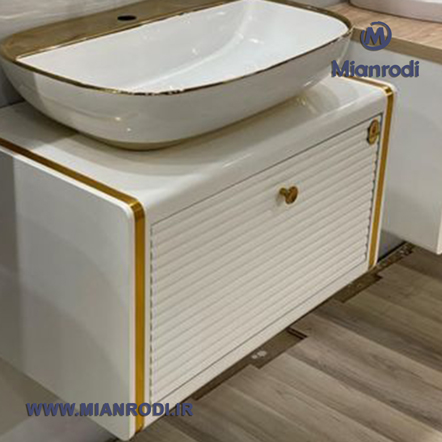 خرید کابینت روشویی لیزانو لوکس کابین در رنگهای سفید و کرم با سنگ روشویی چینی و آینه لمسی هیتردار. بهترین قیمت تجهیزات ساختمانی در فروشگاه میانرودی.